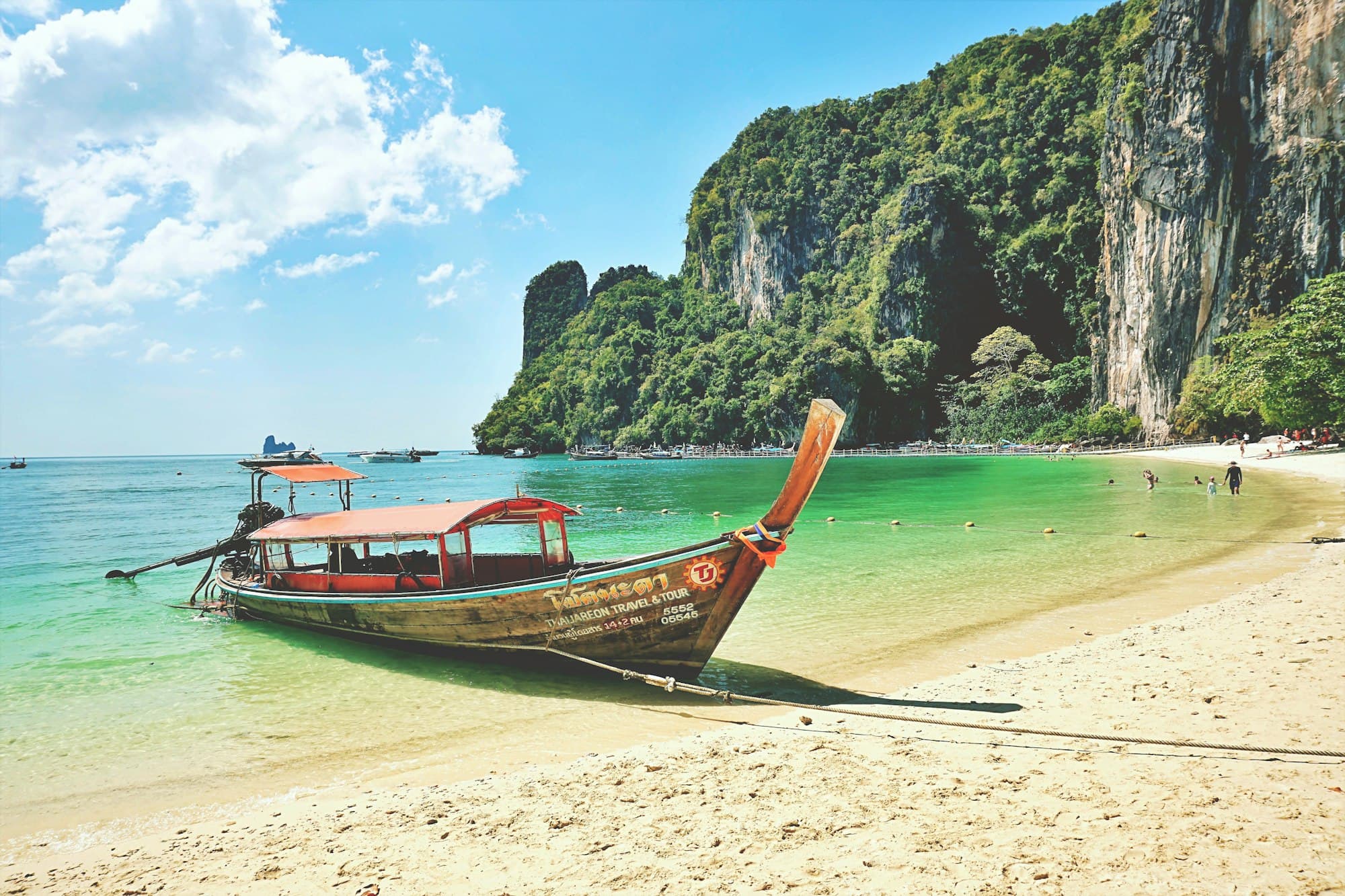 A longtail boat on a Thai beach